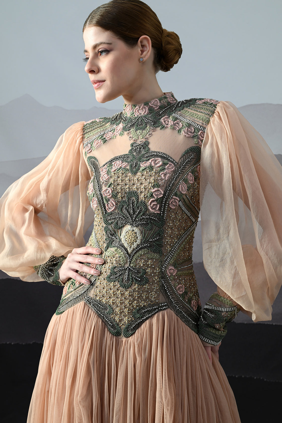 Soft Peach Gown With Sculpted Corsetry And Artisanal Embroidery