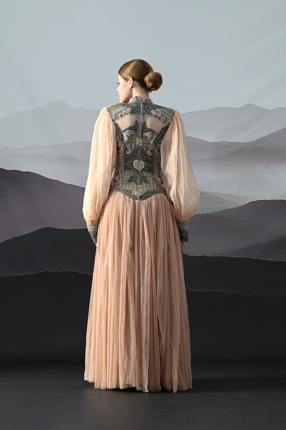 Soft Peach Gown With Sculpted Corsetry And Artisanal Embroidery