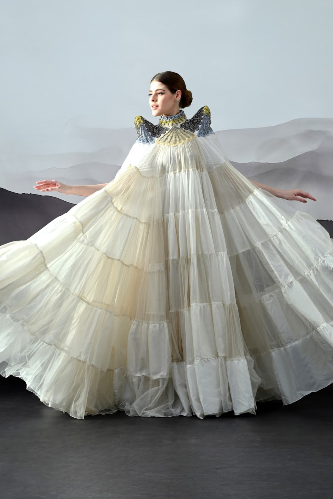 Ivory Dress Featuring Hand-Embroidered High Neck And Cascading Tiered Layers