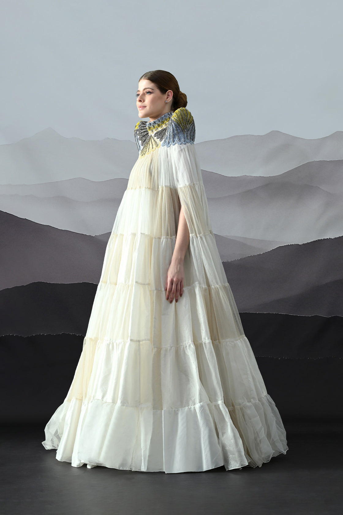 Ivory Dress Featuring Hand-Embroidered High Neck And Cascading Tiered Layers
