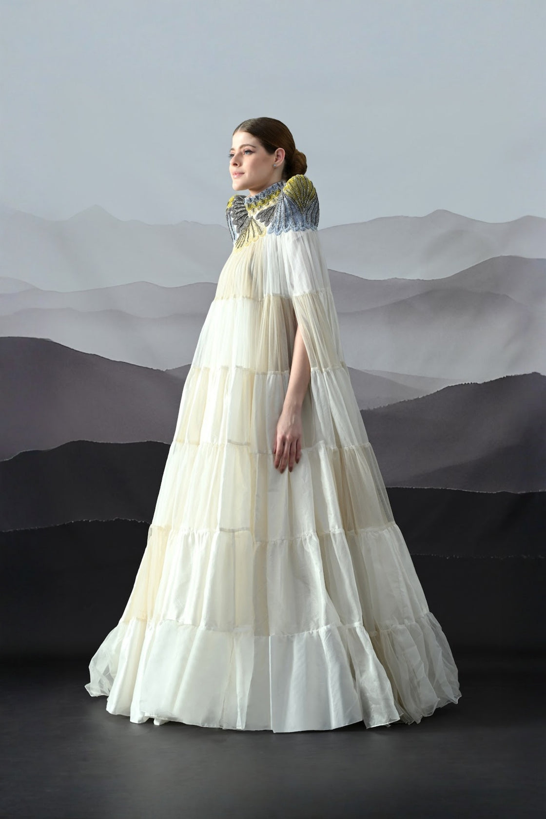 Ivory Dress Featuring Hand-Embroidered High Neck And Cascading Tiered Layers