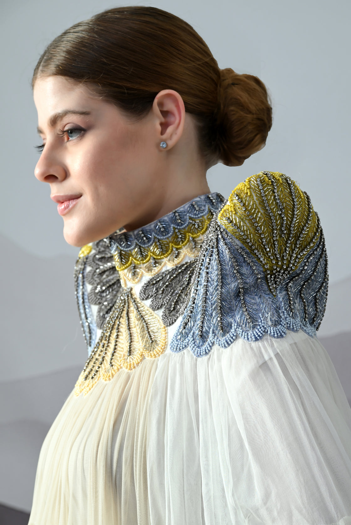 Ivory Gown Featuring Hand-Embroidered High Neck and Cascading Tiered Layers