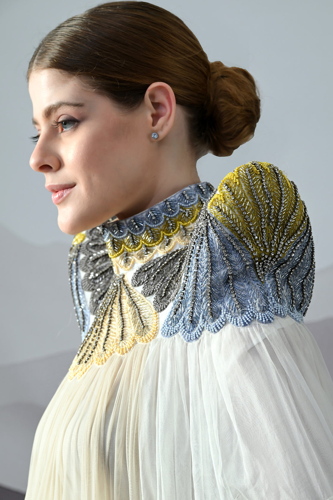 Ivory Dress Featuring Hand-Embroidered High Neck And Cascading Tiered Layers