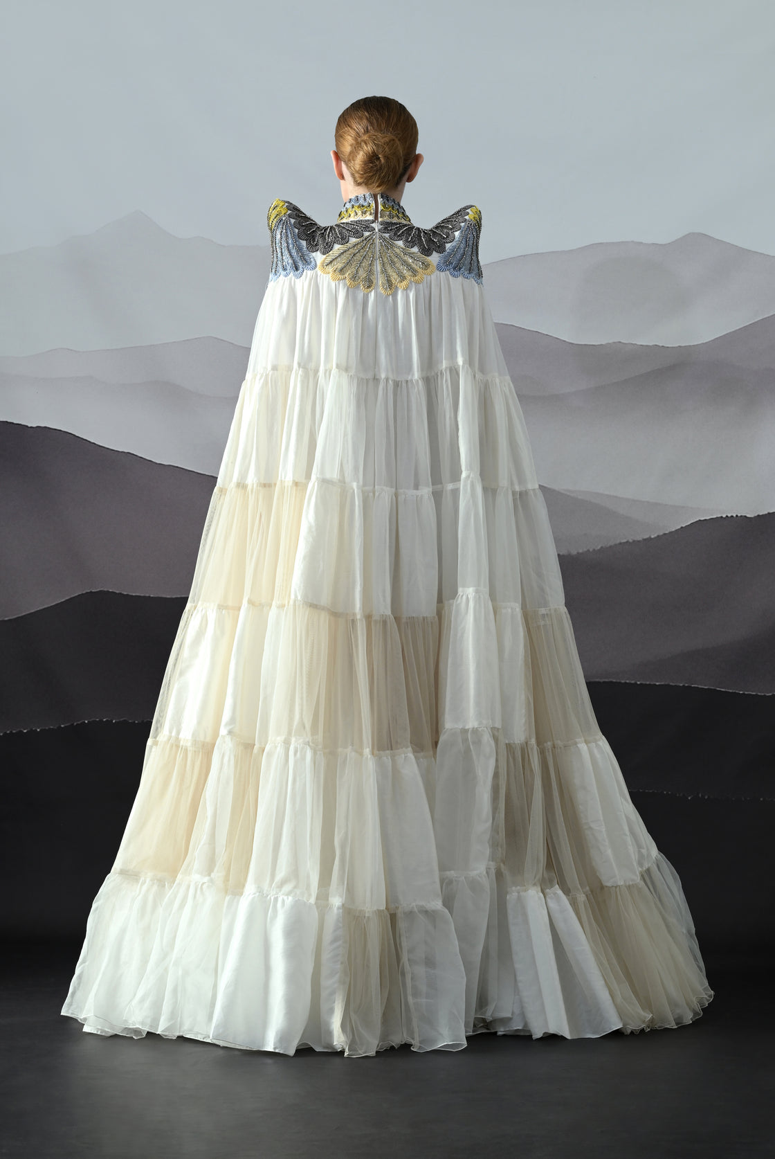 Ivory Gown Featuring Hand-Embroidered High Neck and Cascading Tiered Layers