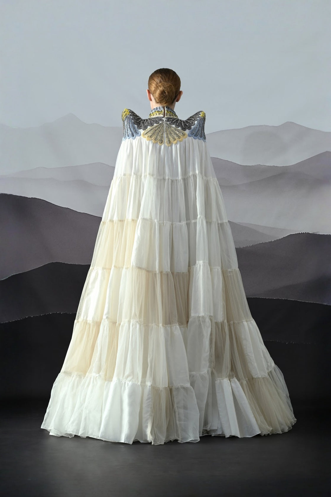 Ivory Dress Featuring Hand-Embroidered High Neck And Cascading Tiered Layers