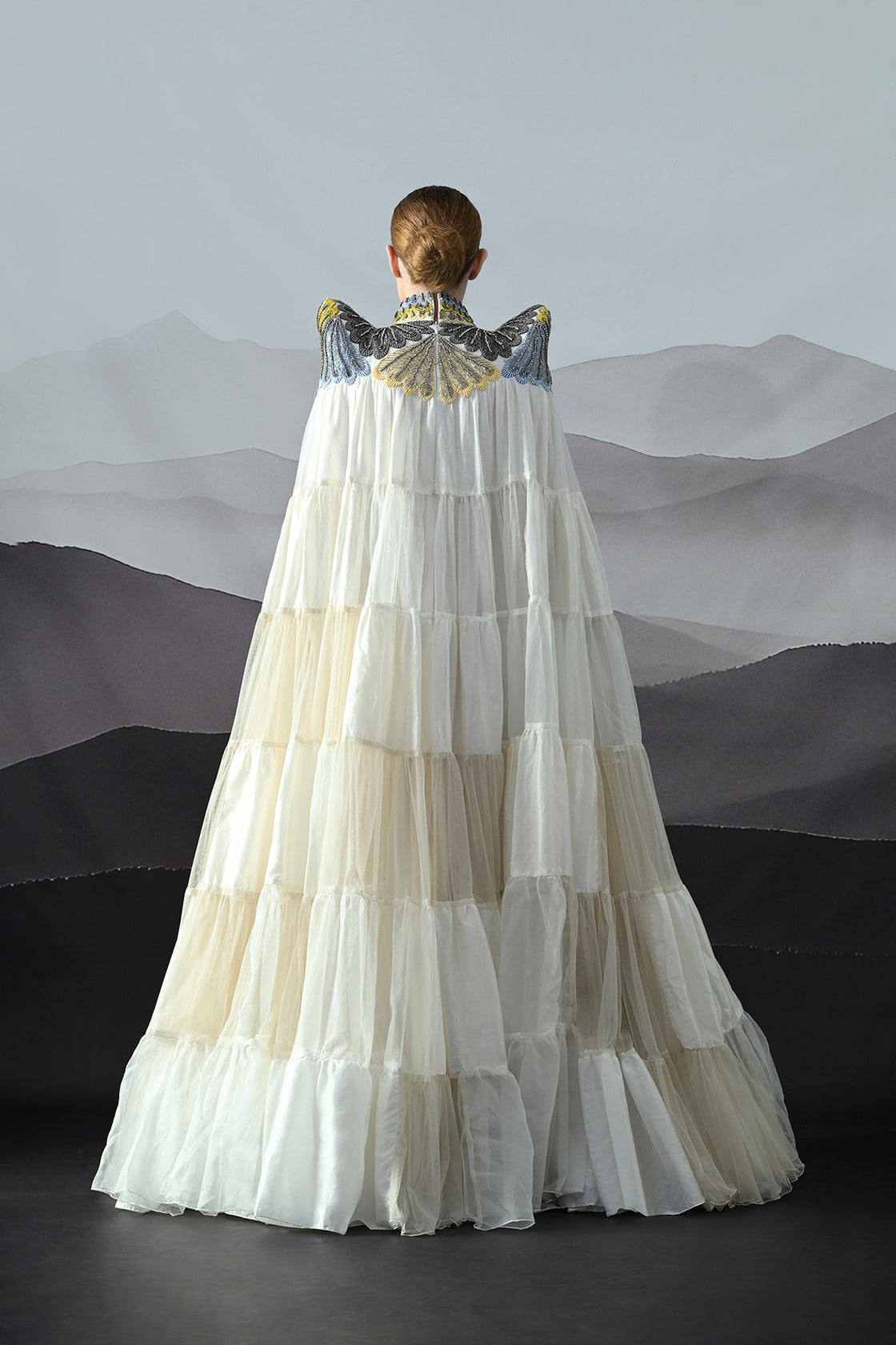 Ivory Dress Featuring Hand-Embroidered High Neck And Cascading Tiered Layers