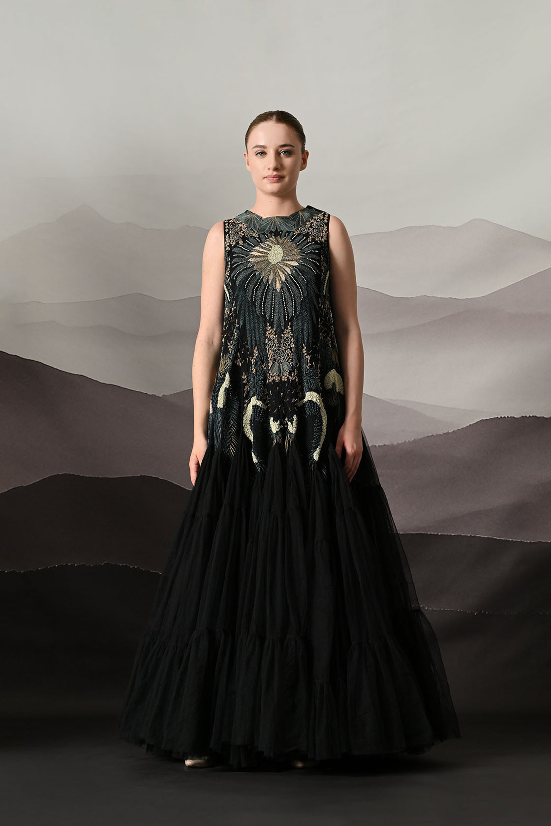 Black Gown With Radiating Hand Embroidery And Soft Tiered Movement