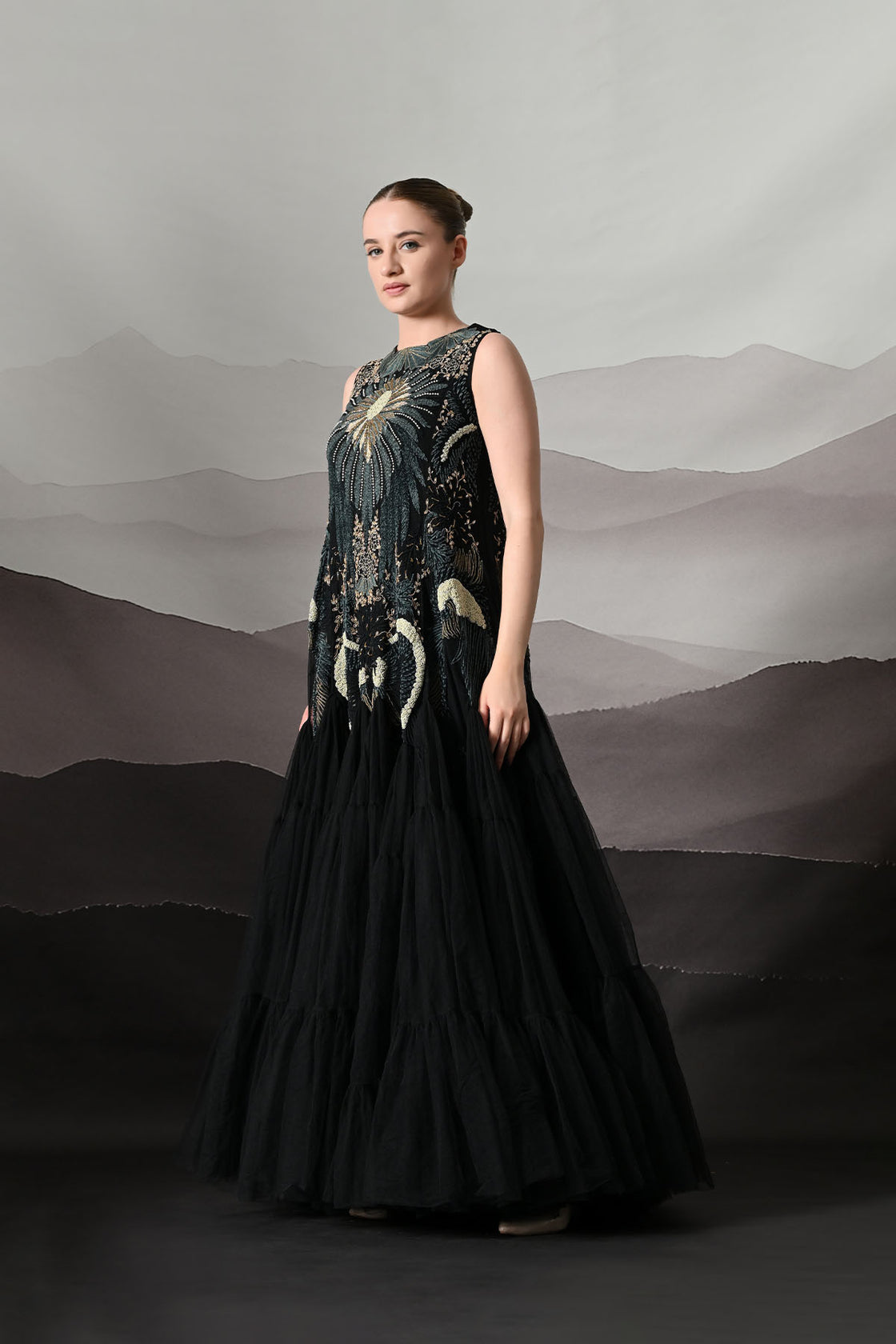 Black Gown With Radiating Hand Embroidery And Soft Tiered Movement