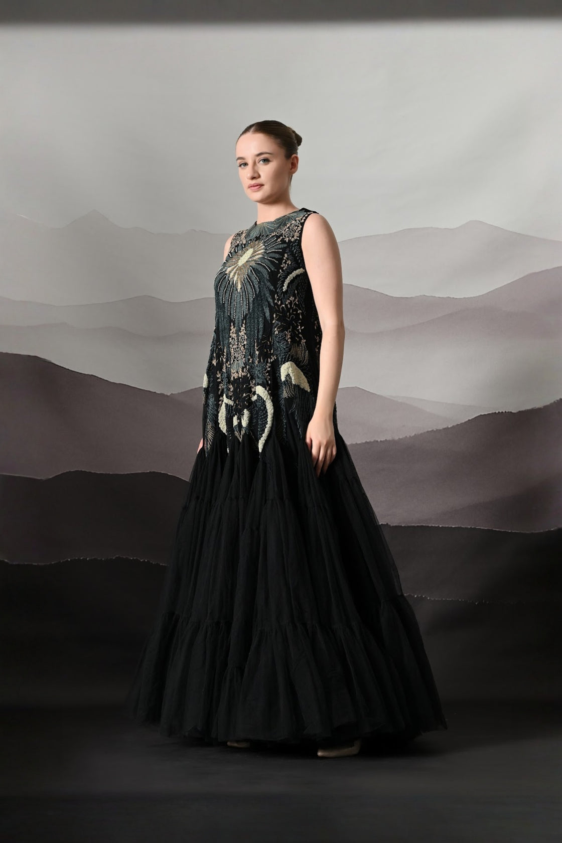 Black Gown With Radiating Hand Embroidery And Soft Tiered Movement