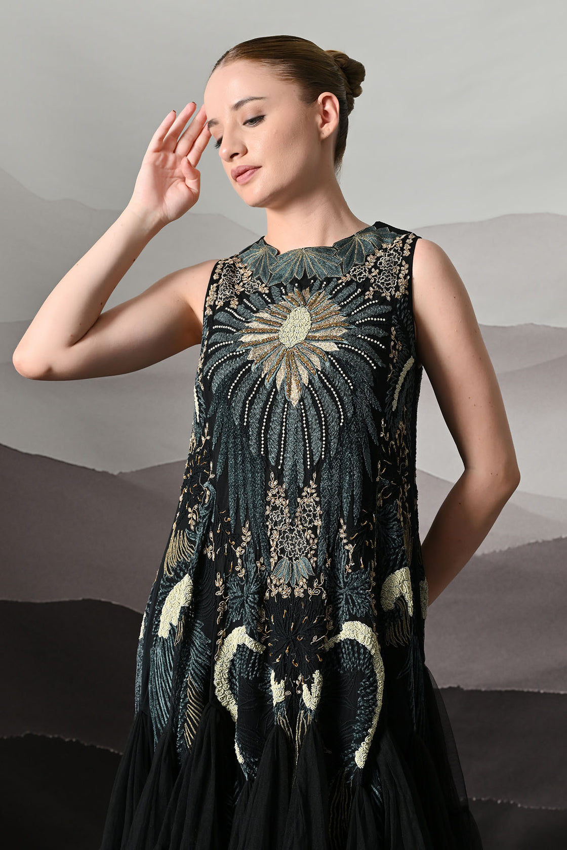 Black Gown With Radiating Hand Embroidery And Soft Tiered Movement