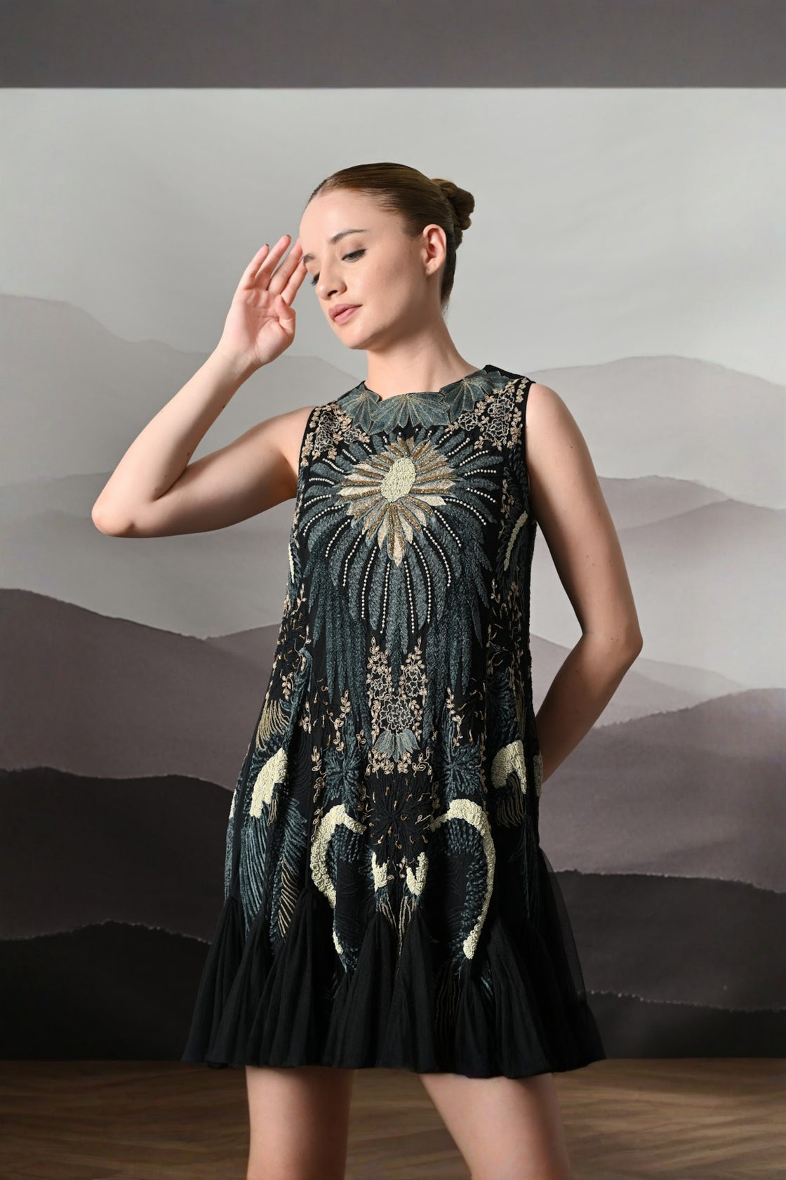 Black Gown With Radiating Hand Embroidery And Soft Tiered Movement