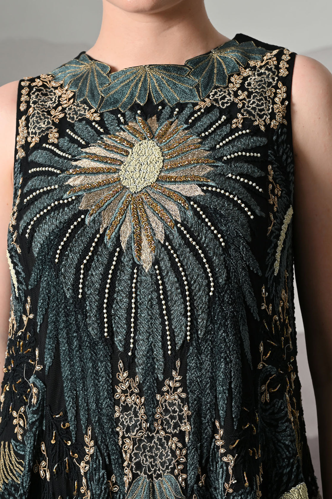 Black Gown With Radiating Hand Embroidery And Soft Tiered Movement