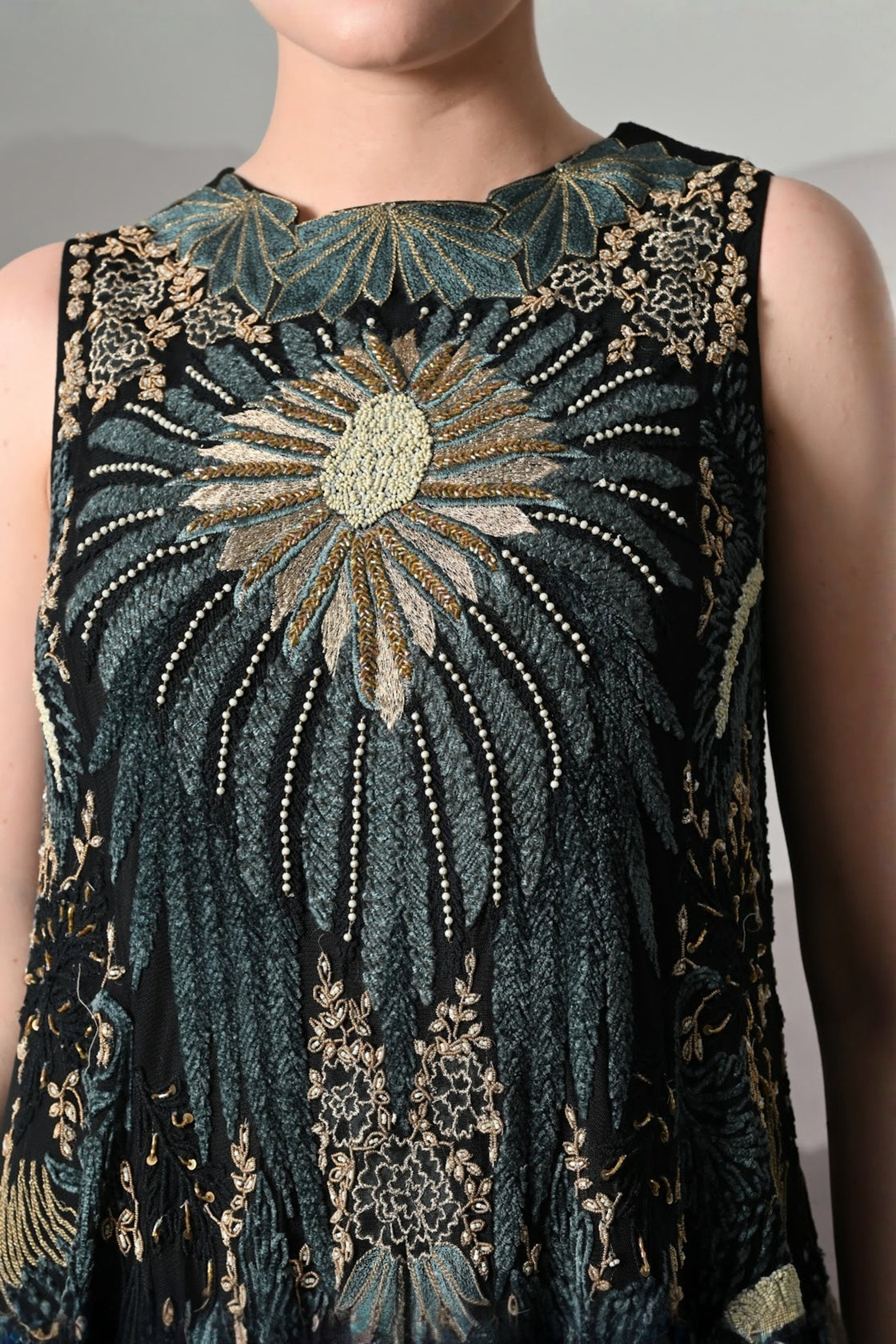 Black Gown With Radiating Hand Embroidery And Soft Tiered Movement