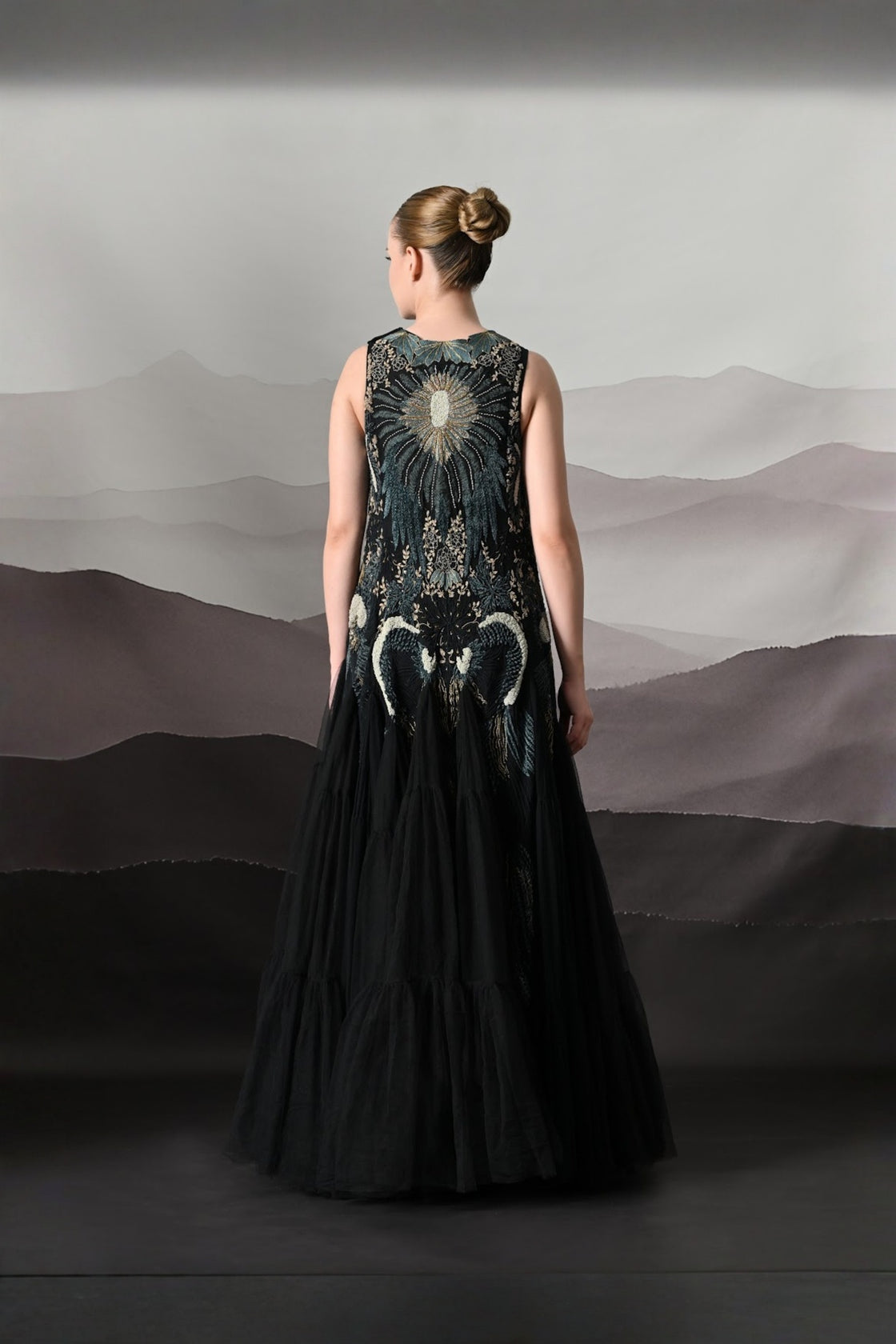 Black Gown With Radiating Hand Embroidery And Soft Tiered Movement
