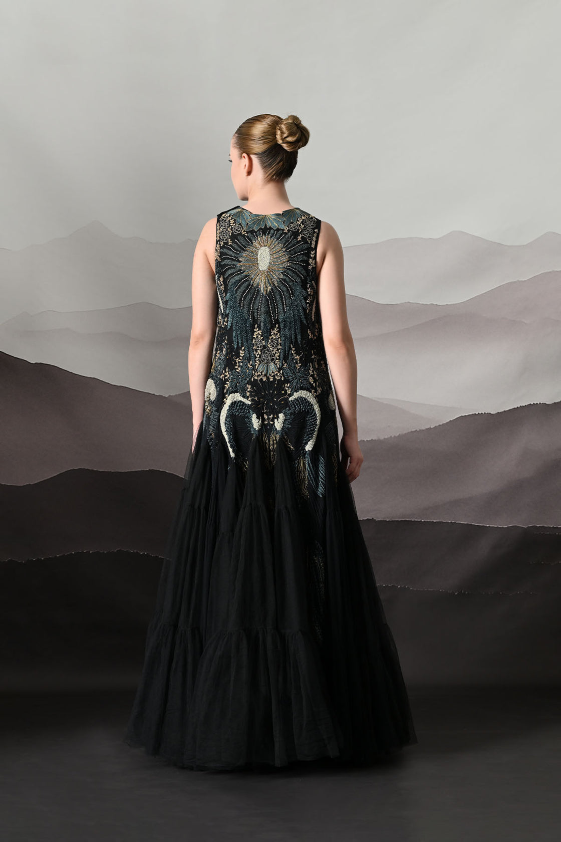 Black Gown With Radiating Hand Embroidery And Soft Tiered Movement