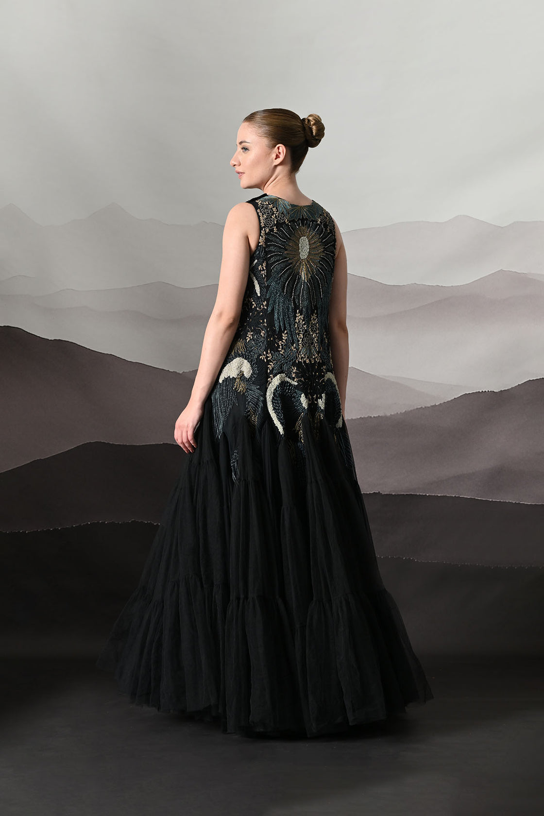 Black Gown With Radiating Hand Embroidery And Soft Tiered Movement