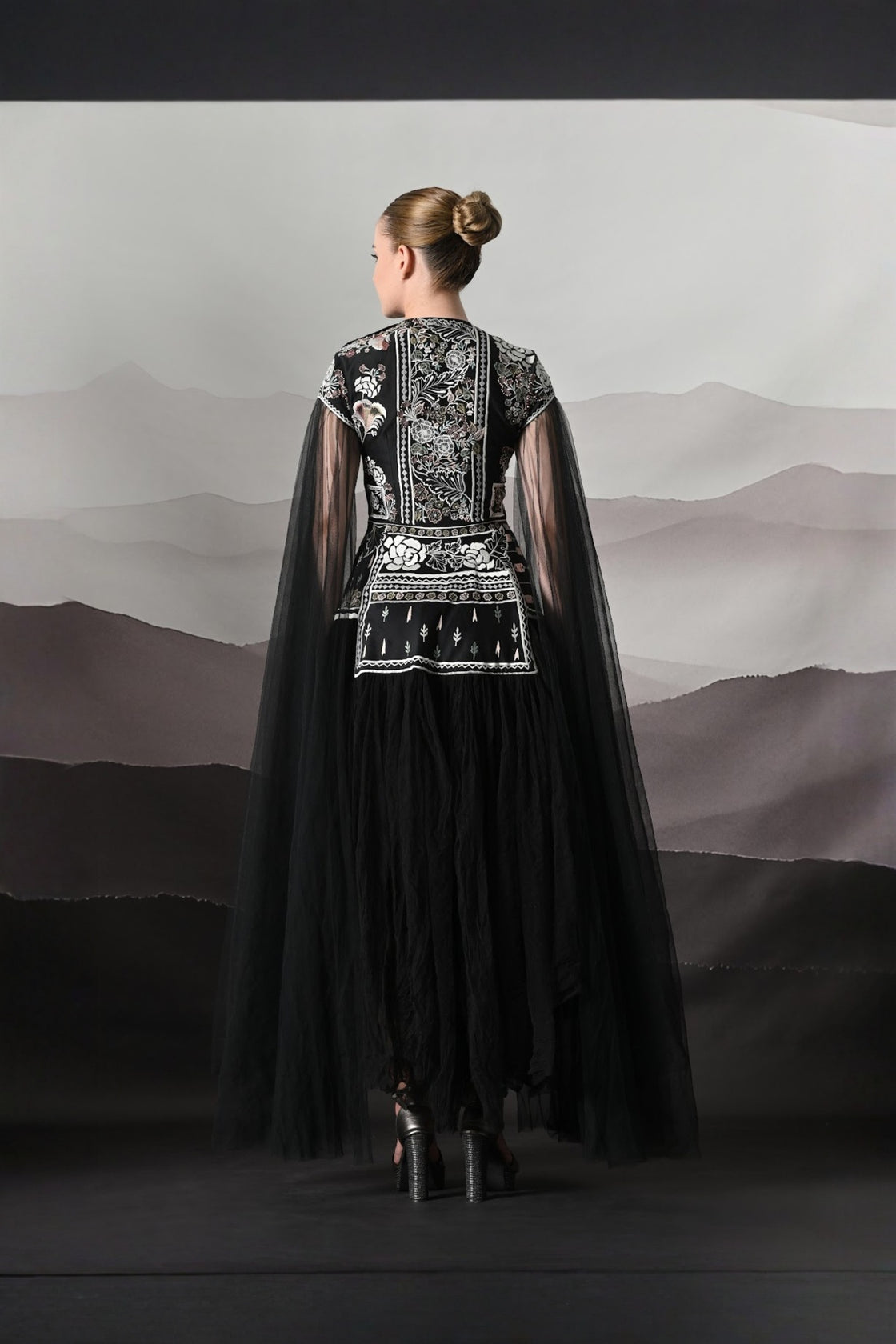 Black Gown With Contrasting Handwork And Architectural Bodice