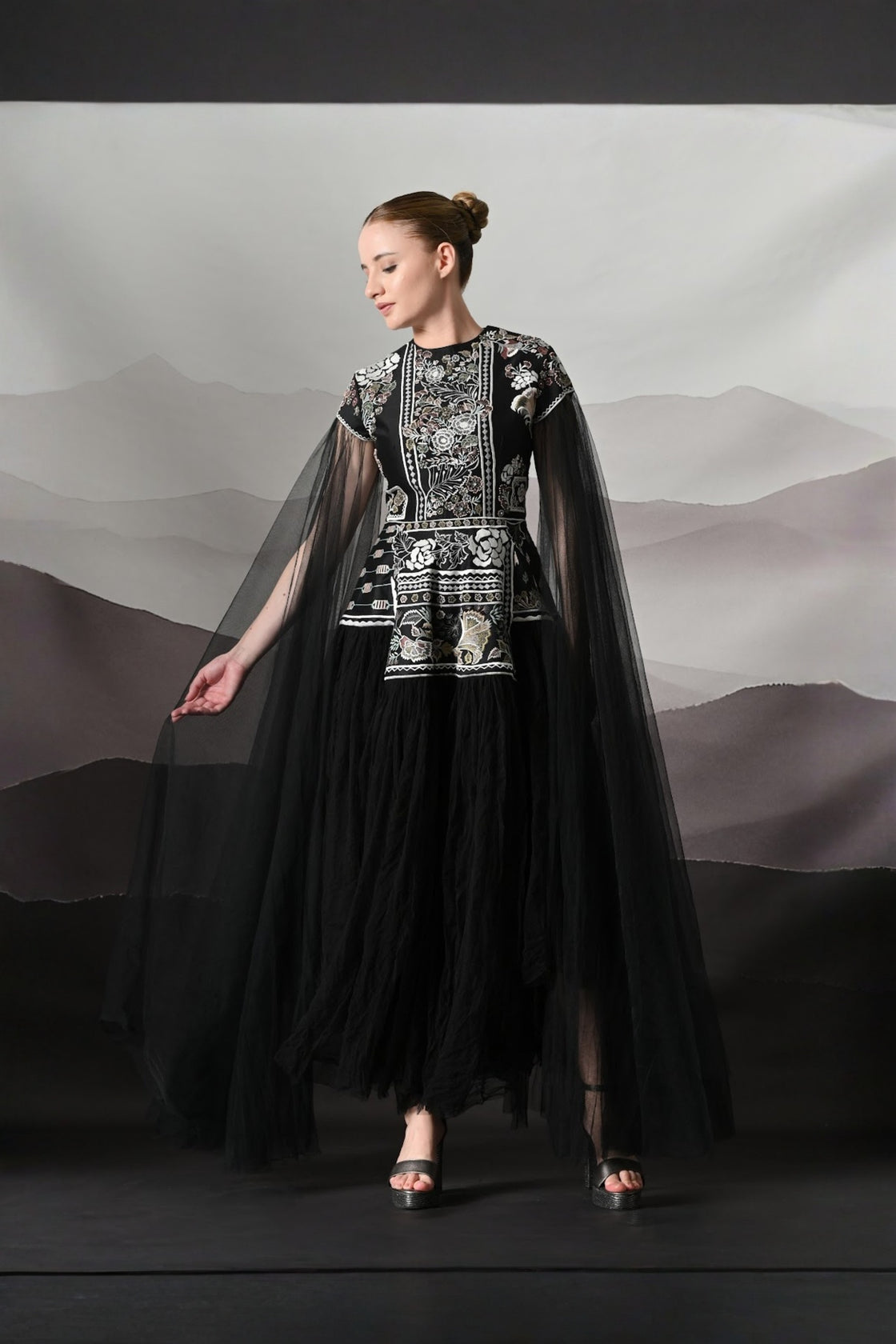 Black Gown With Contrasting Handwork And Architectural Bodice