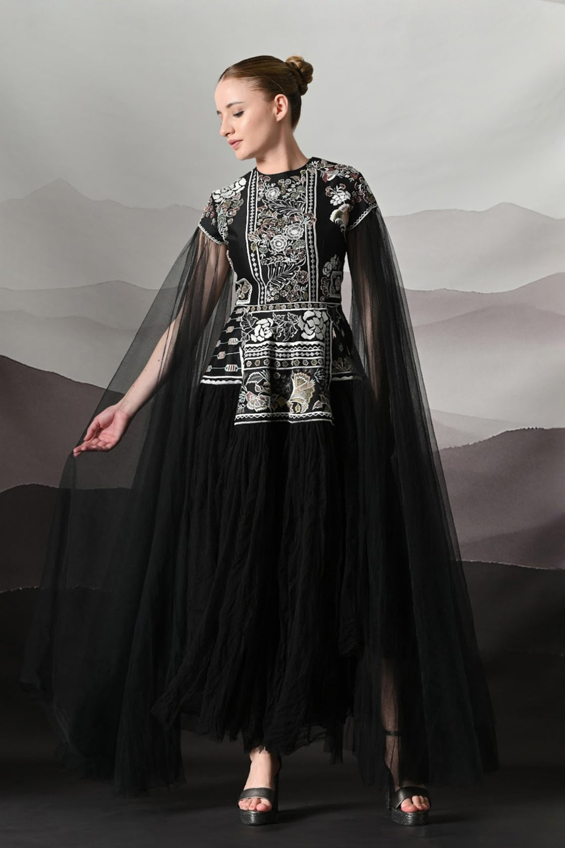 Black Gown With Contrasting Handwork And Architectural Bodice