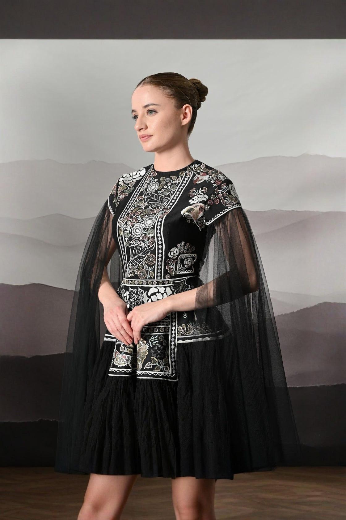Black Gown With Contrasting Handwork And Architectural Bodice