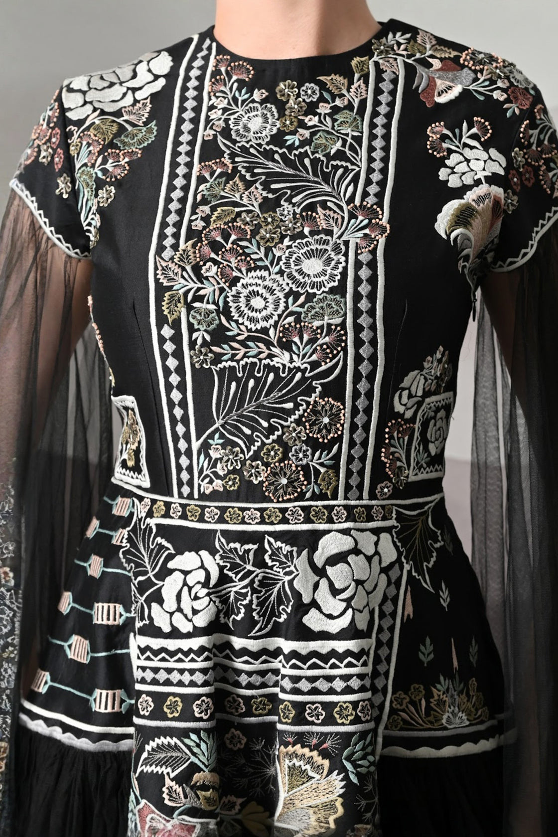 Black Gown With Contrasting Handwork And Architectural Bodice