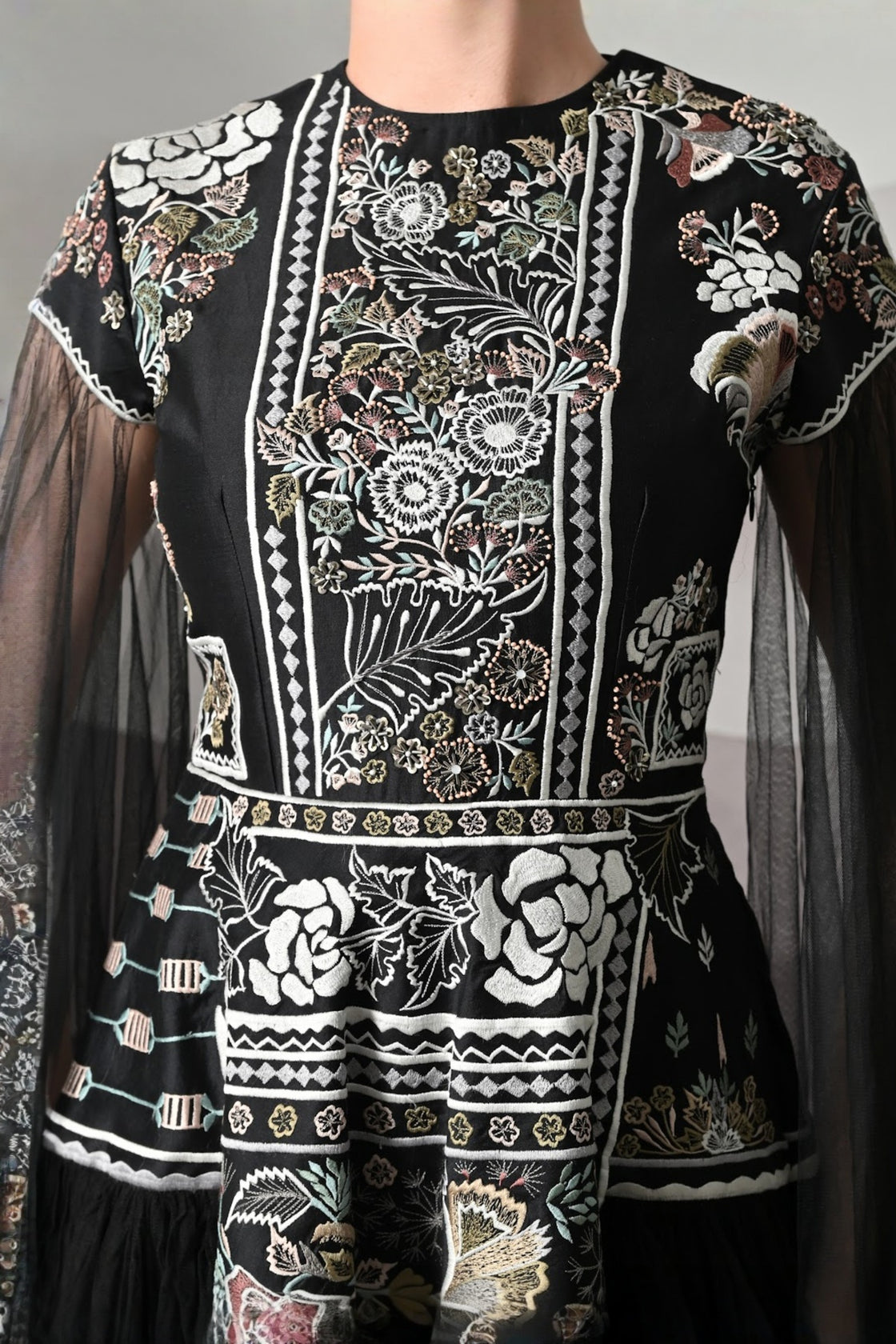 Black Gown With Contrasting Handwork And Architectural Bodice