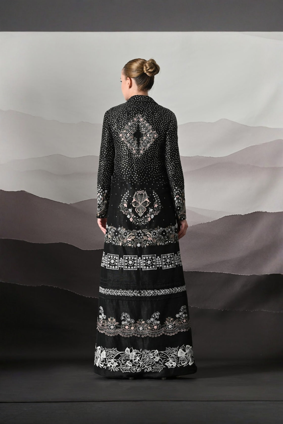 Black Jacket Defined By Precision Handwork And Vertical Continuity