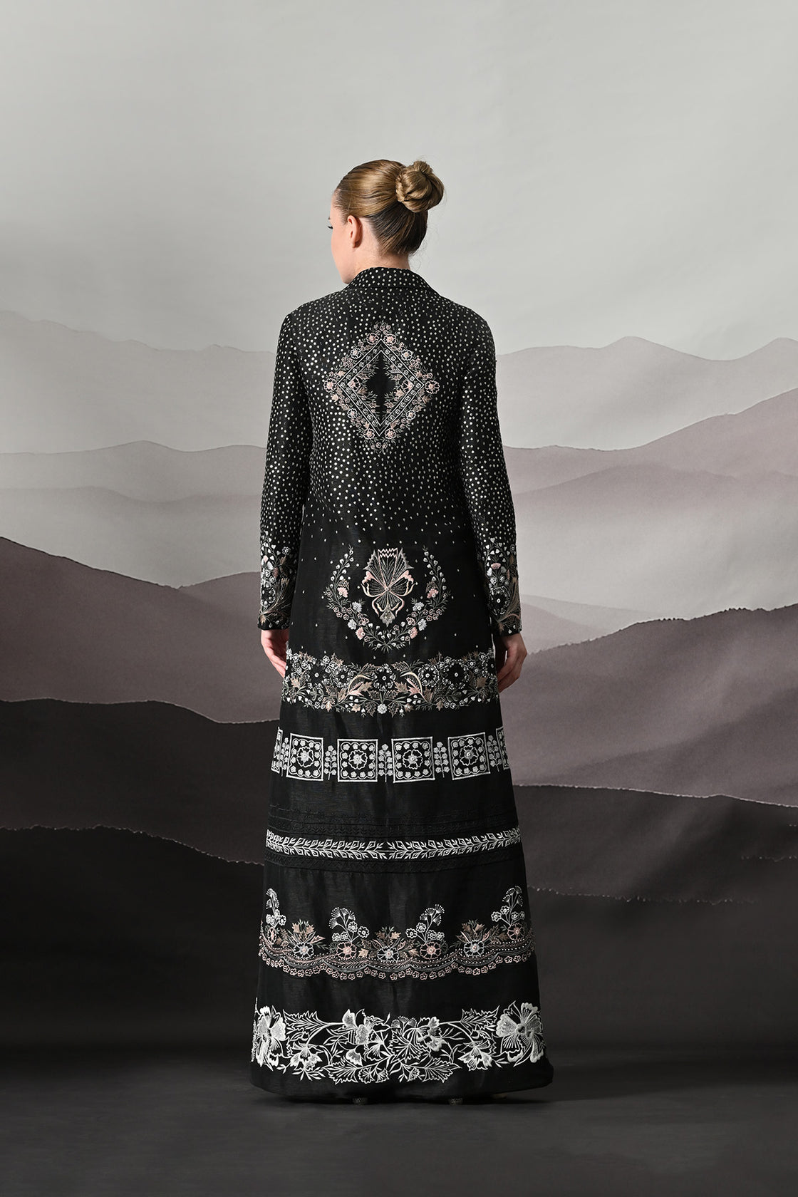 Black Jacket Defined By Precision Handwork And Vertical Continuity