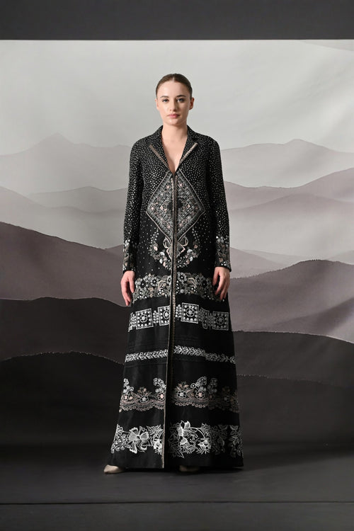 Black Jacket Defined By Precision Handwork And Vertical Continuity