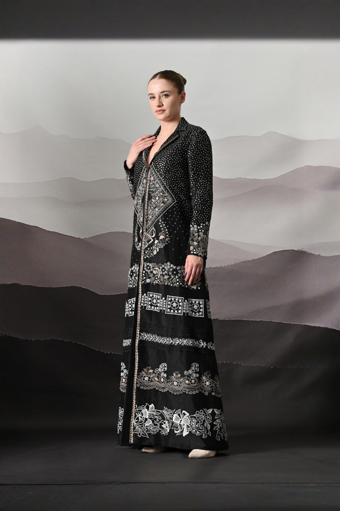 Black Jacket Defined By Precision Handwork And Vertical Continuity