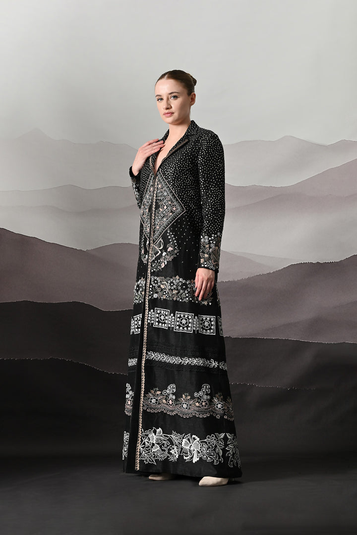 Black Jacket Defined By Precision Handwork And Vertical Continuity