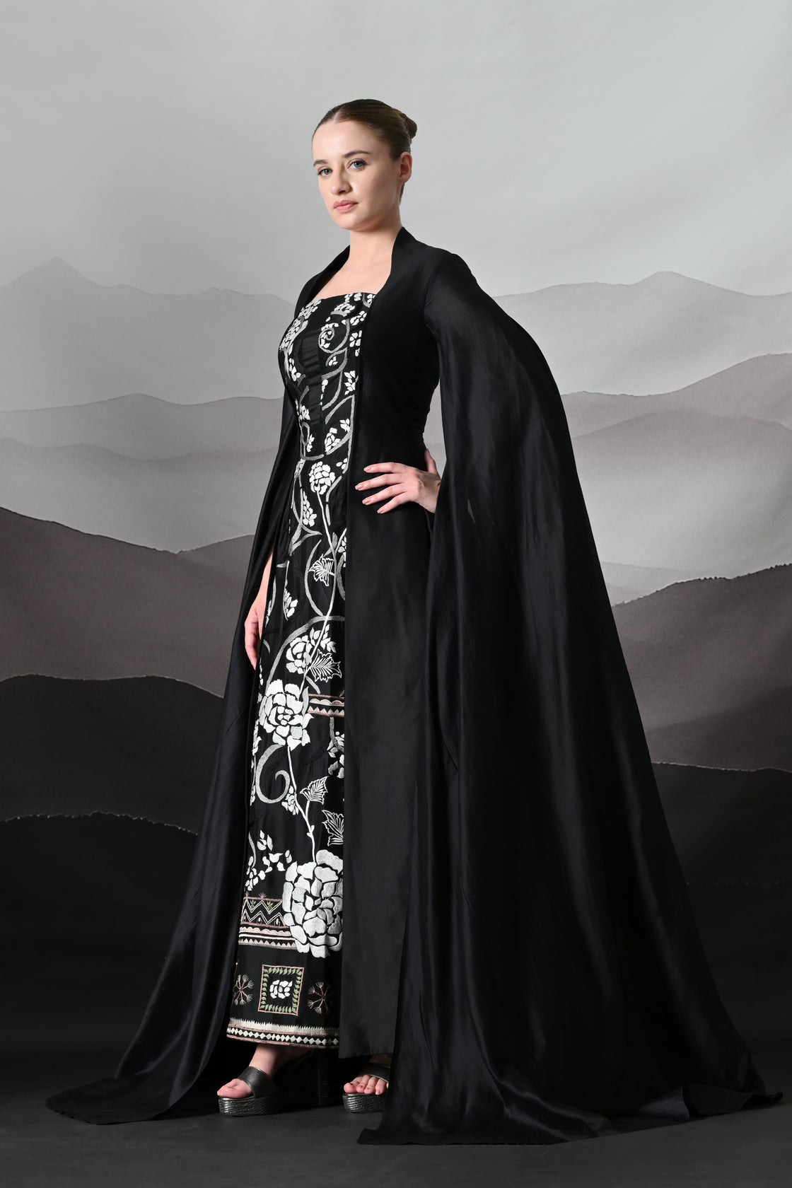 Black Gown with Winged Draped Panels and Handwork Embroidery