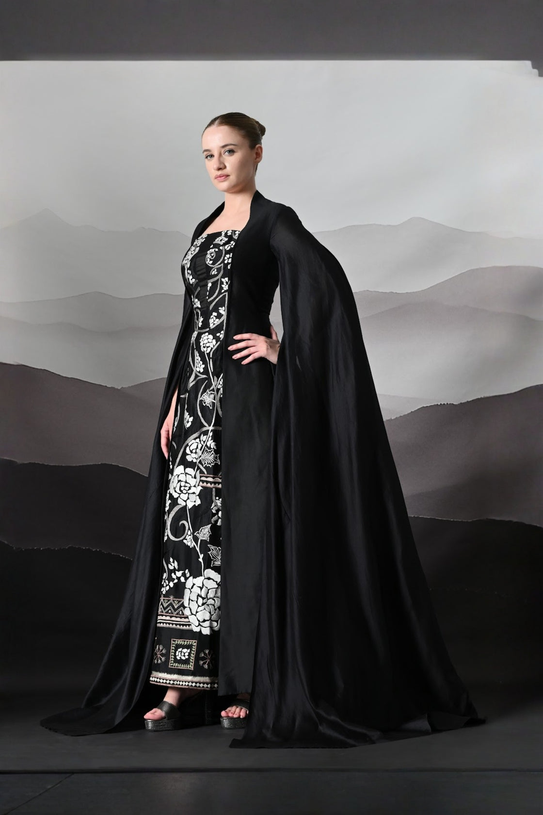 Black Gown With Winged Draped Panels And Handwork Embroidery