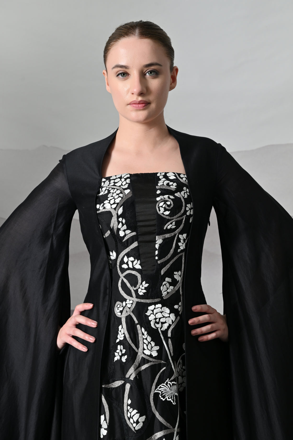 Black Gown with Winged Draped Panels and Handwork Embroidery