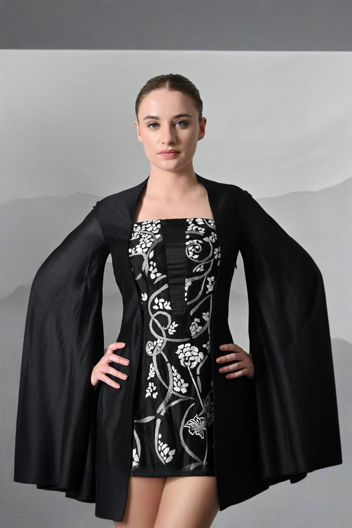 Black Gown With Winged Draped Panels And Handwork Embroidery
