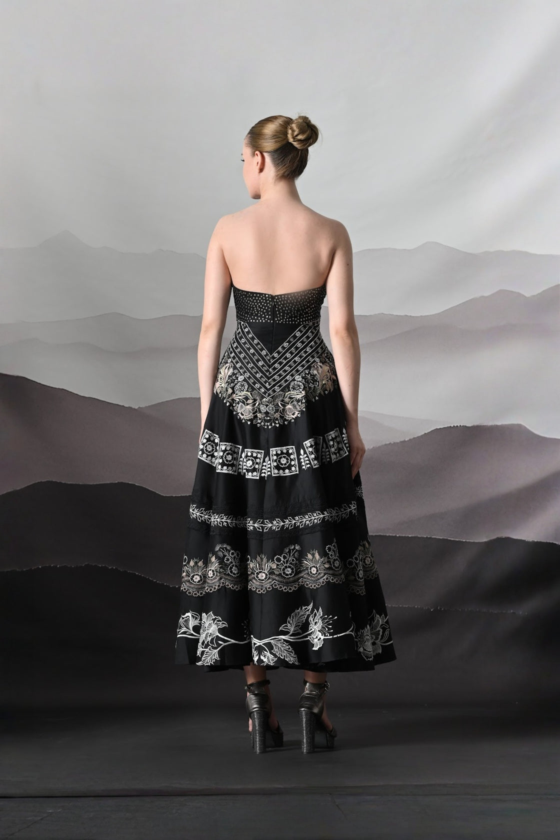 Black Kaftan Defined By Precision Handwork And Vertical Continuity