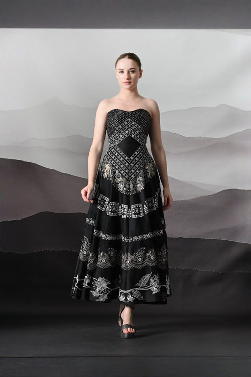 Black Kaftan Defined By Precision Handwork And Vertical Continuity