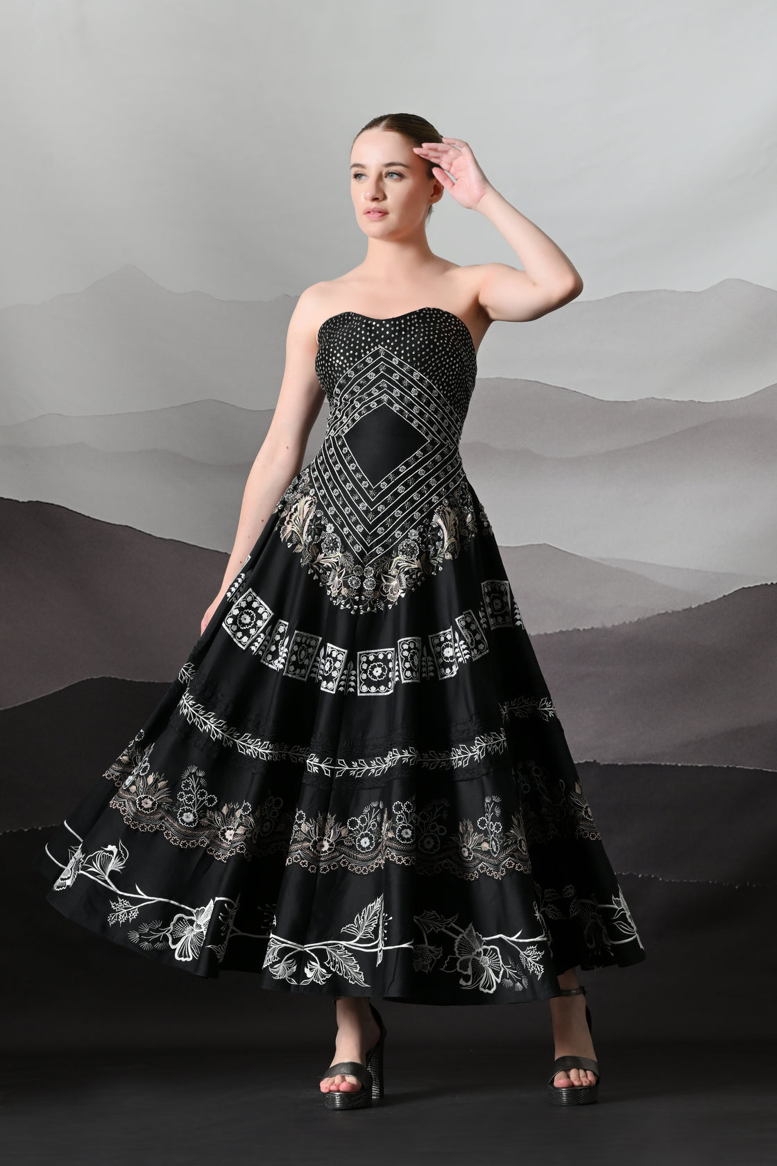 Black Kaftan Defined by Precision Handwork and Vertical Continuity