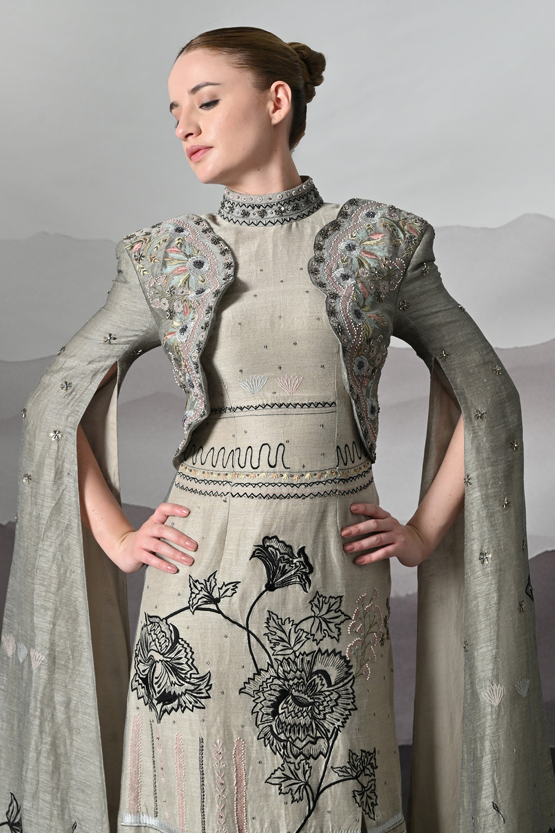Grey Gown With Hand-Embroidered Linear Detail And Structured Drape