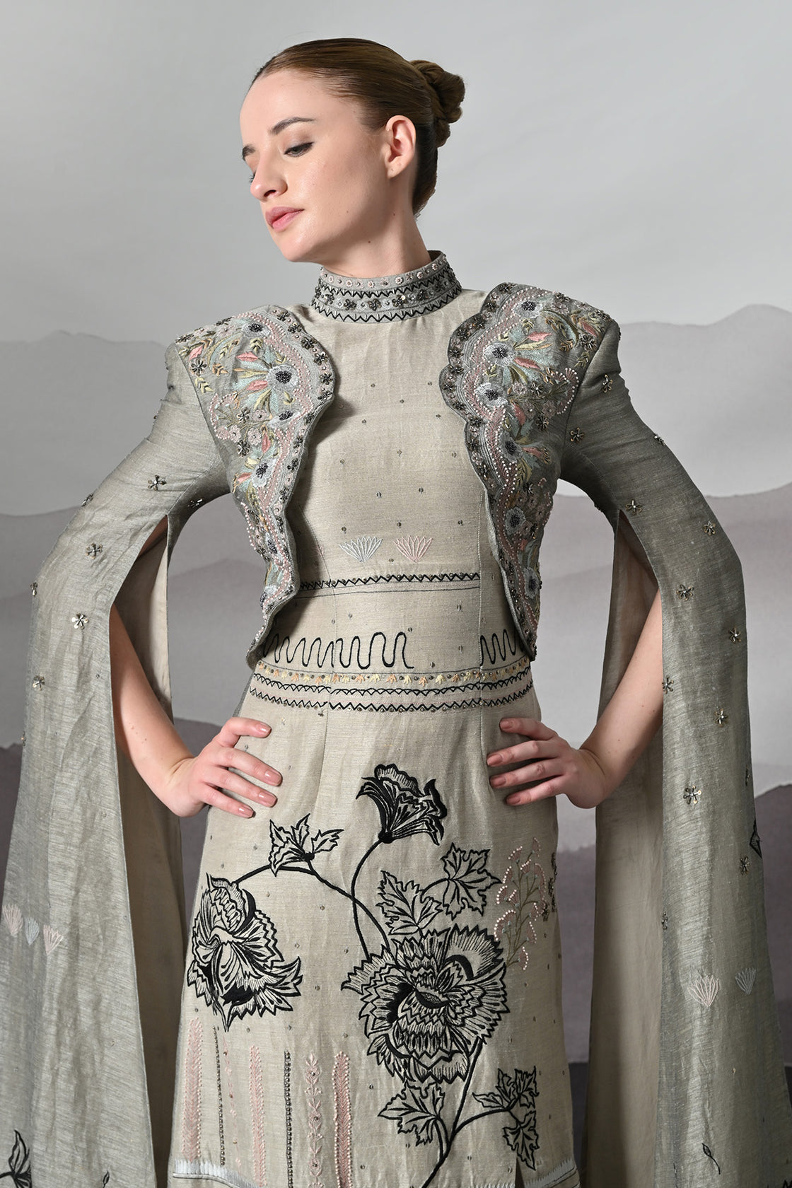 Grey Gown With Hand-Embroidered Linear Detail And Structured Drape