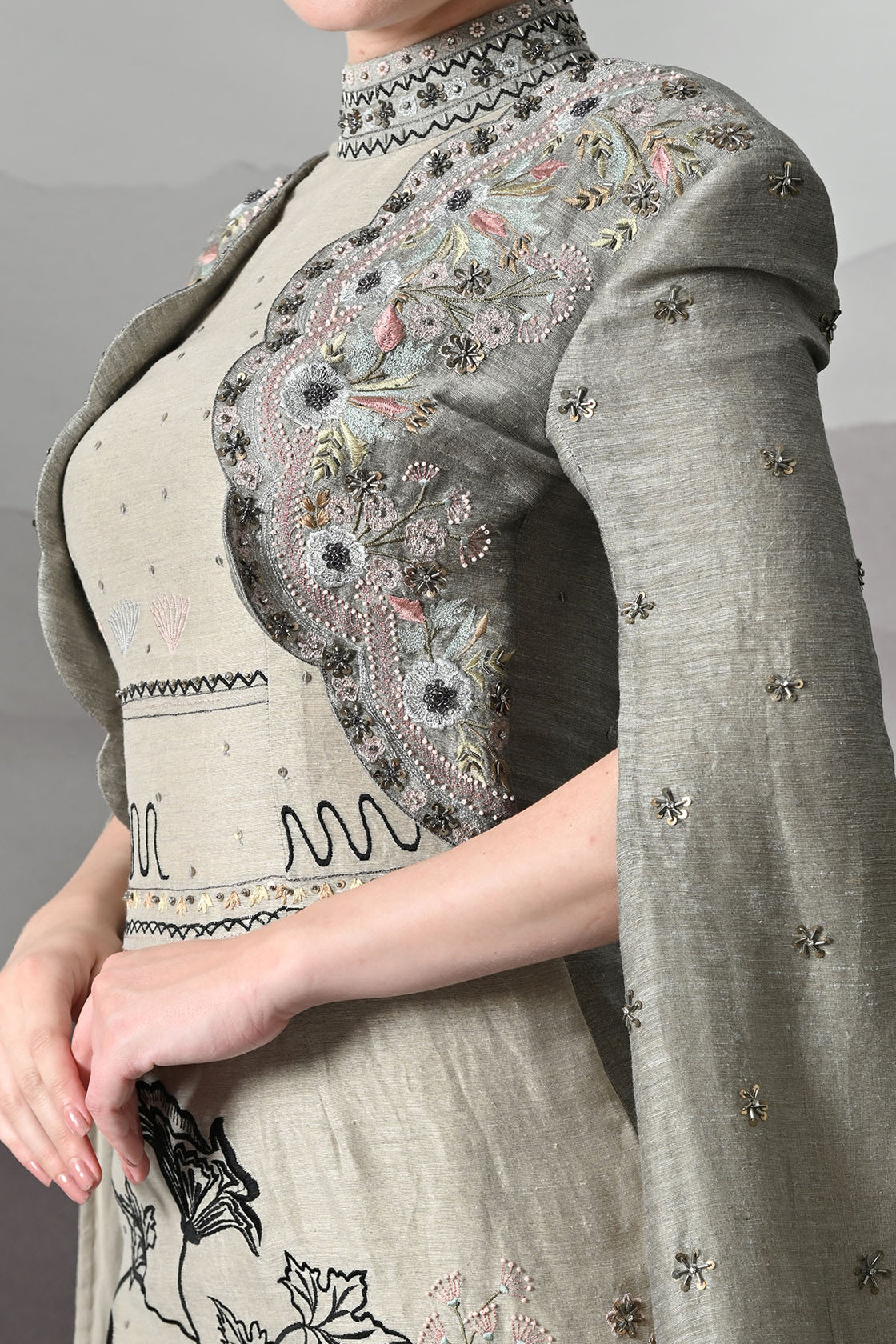 Grey Gown With Hand-Embroidered Linear Detail And Structured Drape