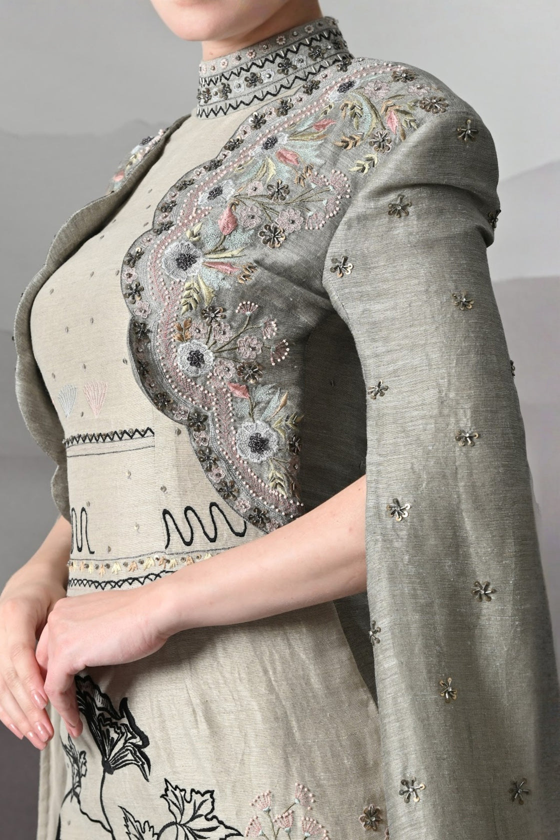 Grey Gown With Hand-Embroidered Linear Detail And Structured Drape