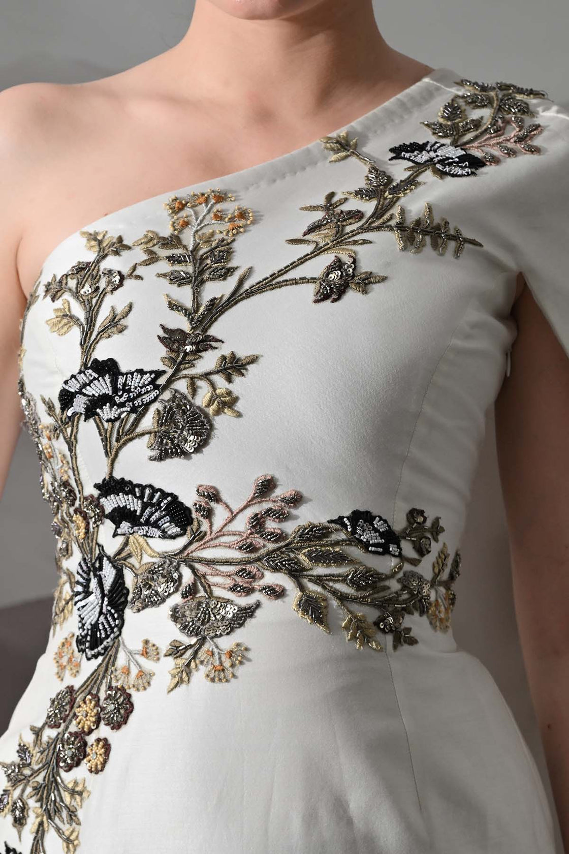 Elegant  Gown Featuring A One-Shoulder Bodice With Embroidered Detailing