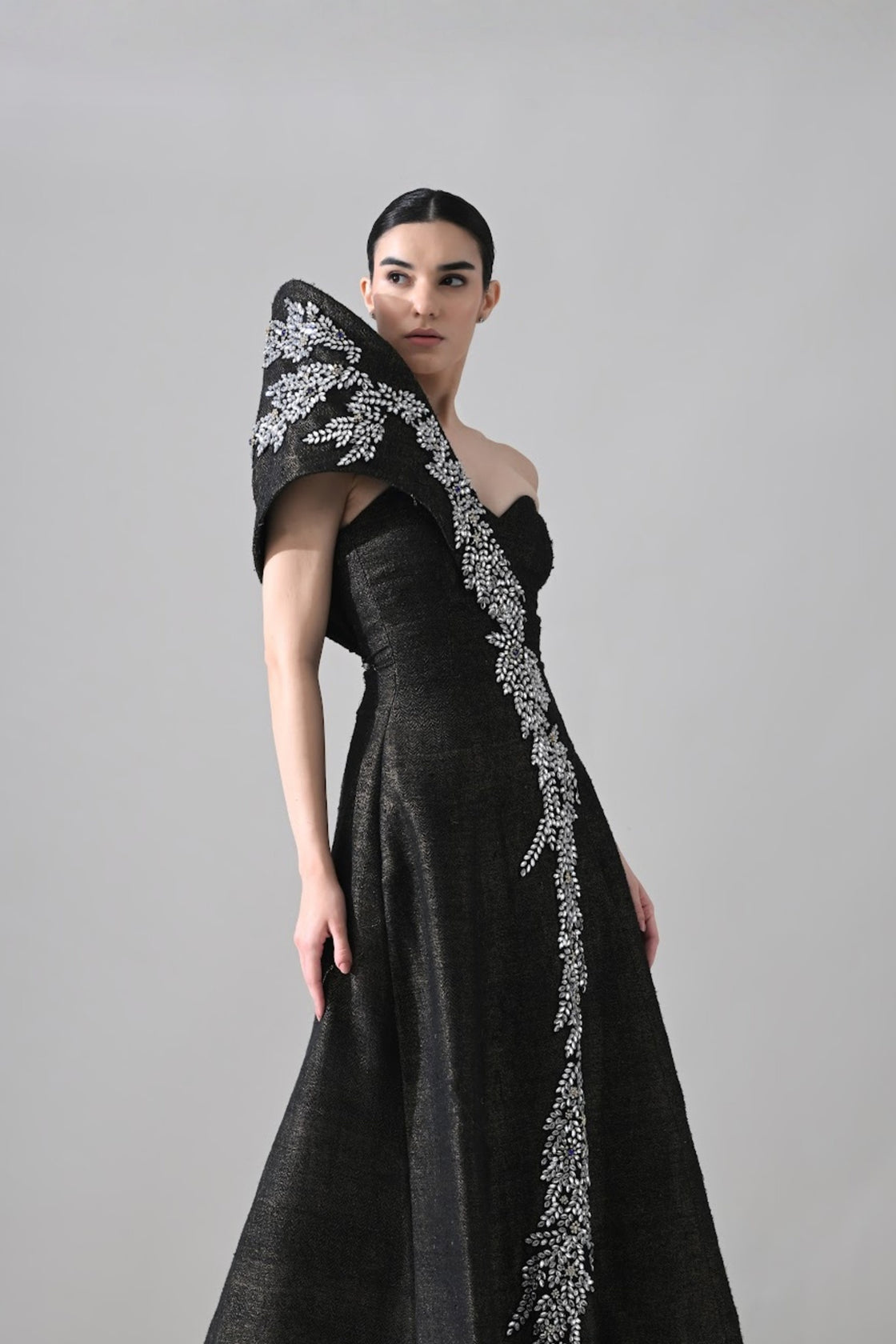Black Sculpted Gown With Cascading Asymterical Crystal Handwork