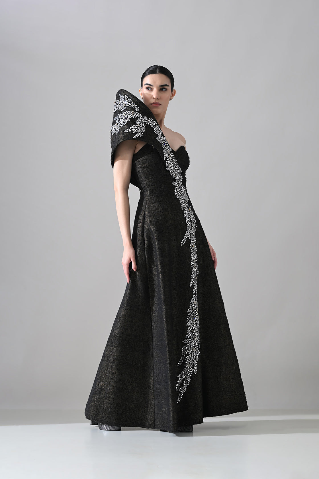 Black Sculpted Gown With Cascading Asymterical Crystal Handwork