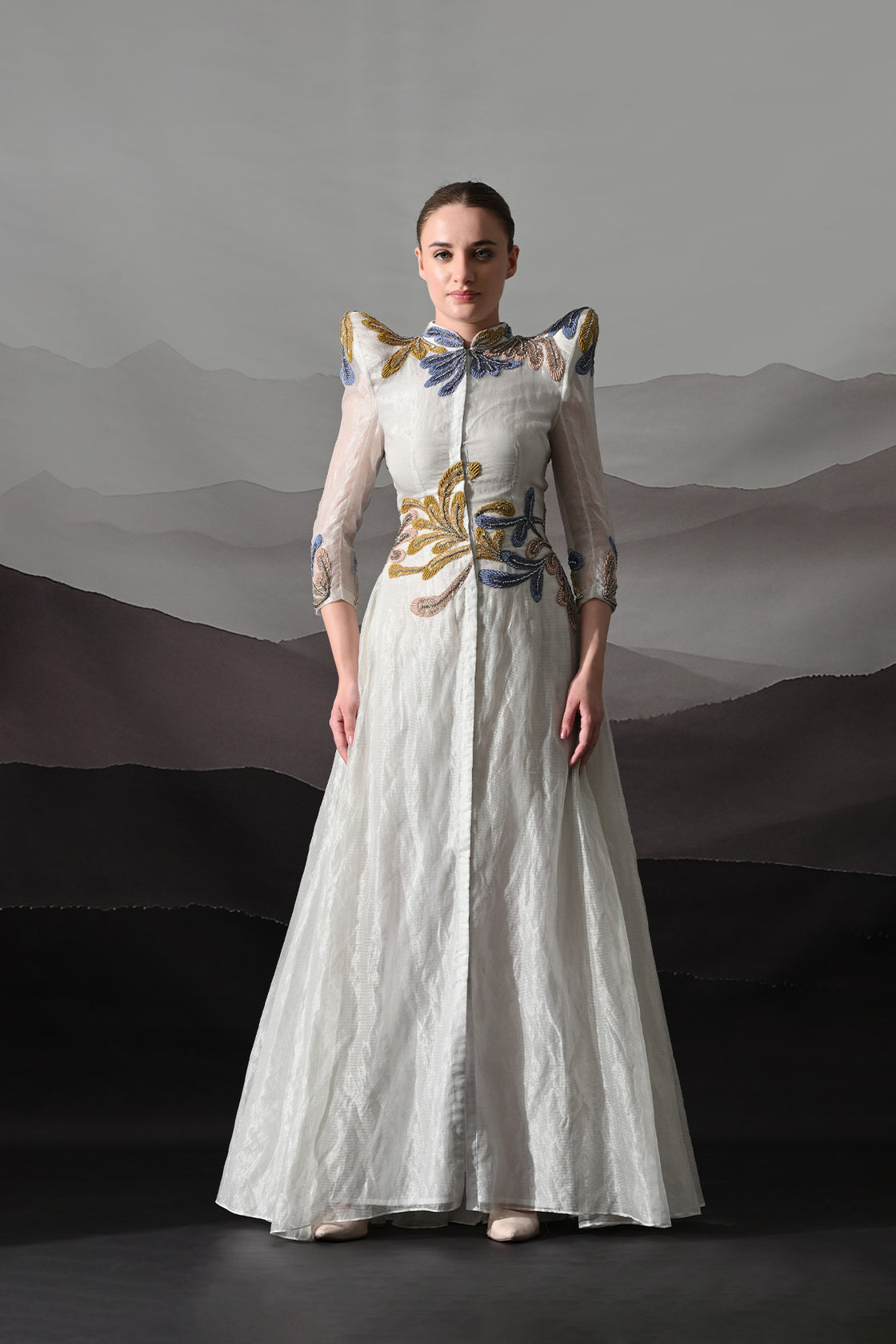 White Gown With Artisanal Floral Embroidery And Structured Silhouette