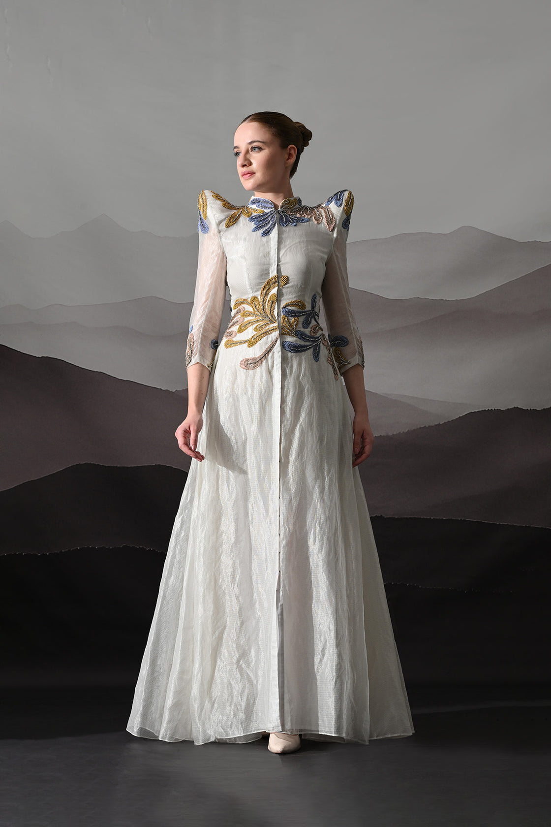 White Gown With Artisanal Floral Embroidery And Structured Silhouette
