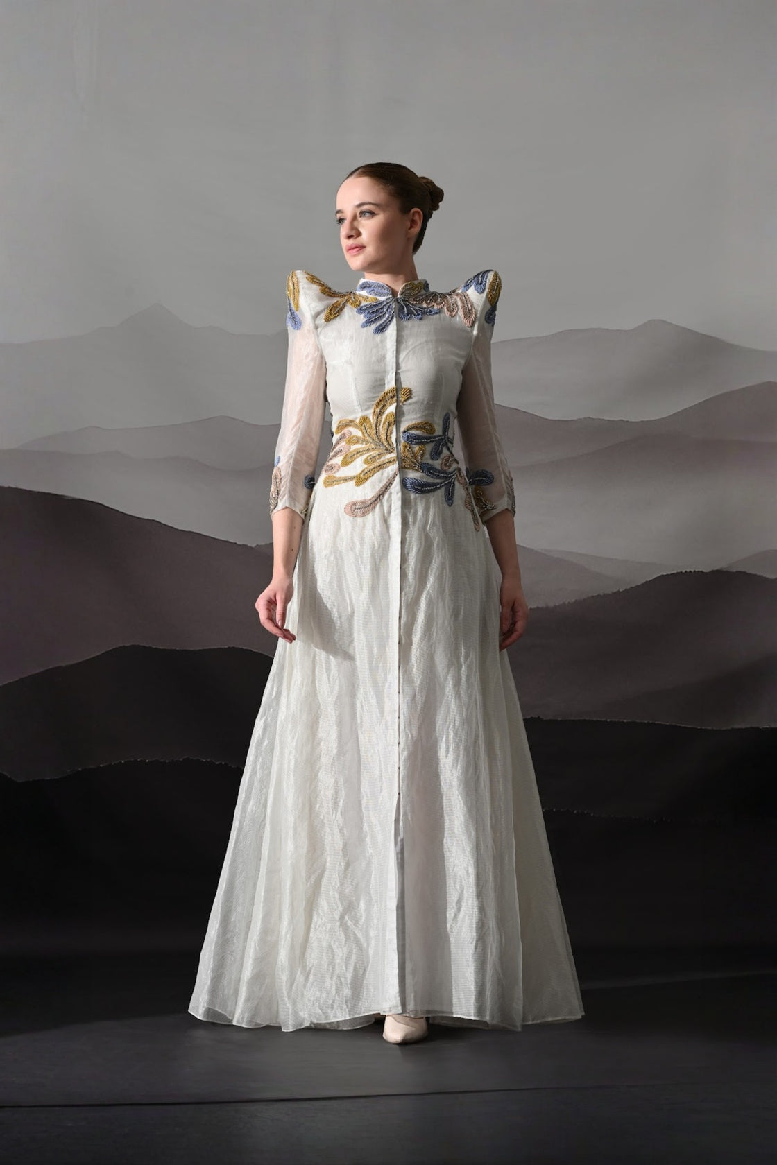 White Gown With Artisanal Floral Embroidery And Structured Silhouette