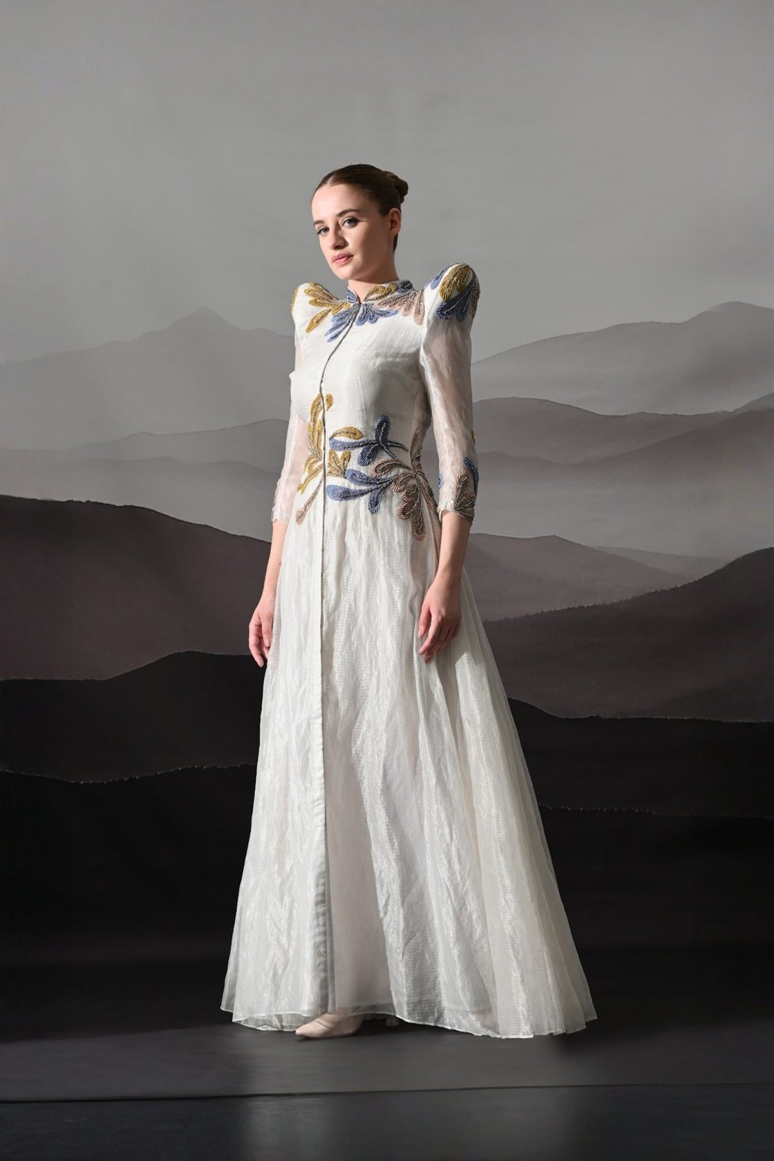 White Gown With Artisanal Floral Embroidery And Structured Silhouette