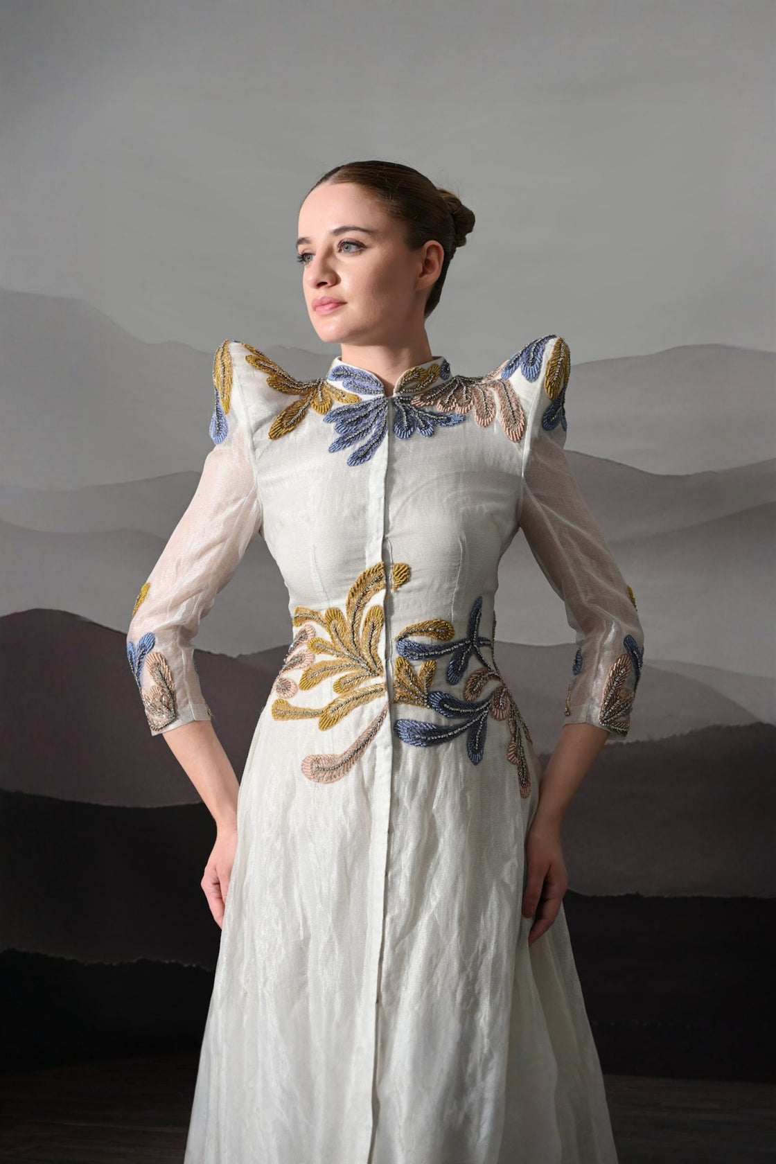 White Gown With Artisanal Floral Embroidery And Structured Silhouette